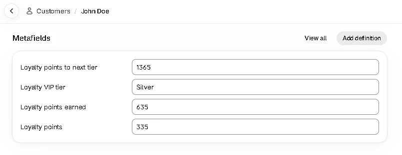 A member's points and tier in their customer metafields in Shopify.