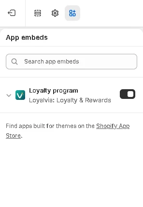 The Loyalty program app embed, switched on in the theme editor.